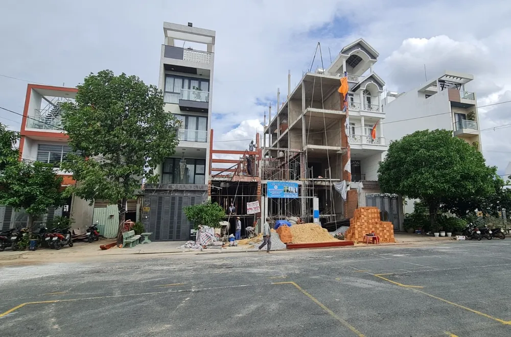 Tốc độ đô thị hóa của quận 12 diễn ra mạnh mẽ, do đó TP.HCM dự kiến sẽ giảm hạn mức công nhận đất ở địa phương này. Ảnh: NGUYỄN CHÂU hạn mức công nhận đất.jpg