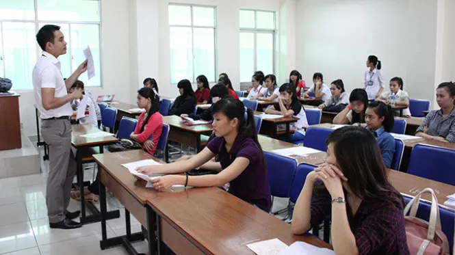 Thí sinh dự thi vào Trường ĐH Sư phạm TP.HCM năm 2014 - Ảnh: Minh Giảng
