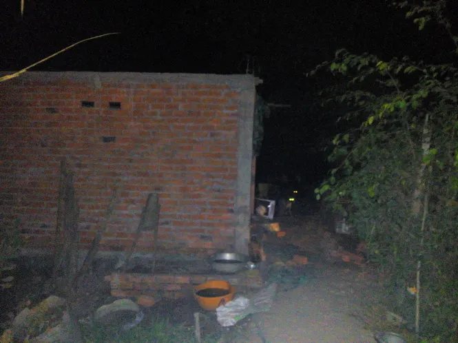 Căn nhà hiện trường nơi phát hiện xác chị Lan - Ảnh: Sơn Lâm Căn nhà hiện trường nơi phát hiện xác chị Lan - Ảnh: Sơn Lâm