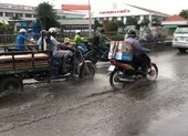 Sớm khắc phục tình trạng đọng nước tại vòng xoay An Khánh, Bến Tre ảnh 2 Quốc lộ 13 ngập chìm trong nước sau cơn mưa nhỏ