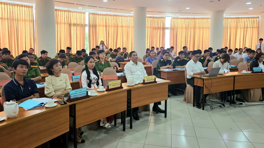 Toàn cảnh hội nghị tập huấn do Trung tâm trợ giúp pháp lý Nhà nước TP.HCM tổ chức. Ảnh: SONG MAI