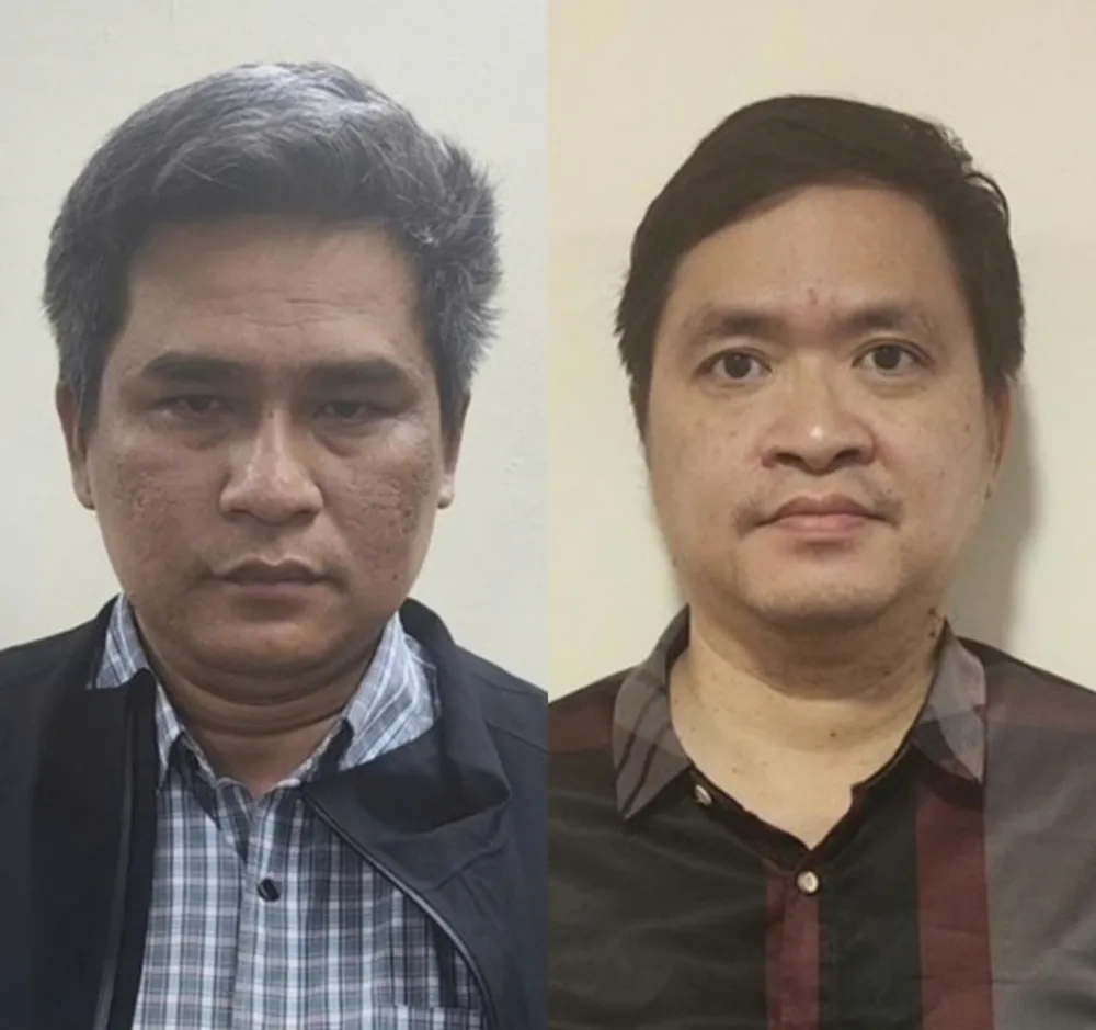 Bị can Ngô Võ Kế Thành (cựu Giám đốc Trung tâm R&D, bìa trái) và bị can Hoàng Minh Bá (Giám đốc Công ty T.S.T). Ảnh: BỘ CÔNG AN vi phạm đấu thầu.jpg