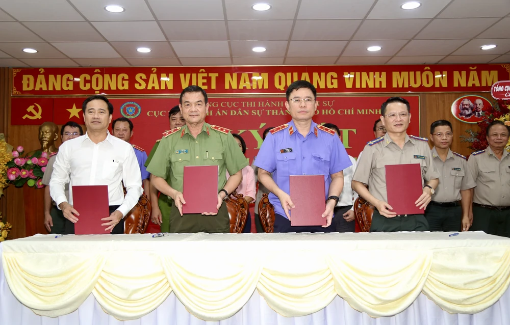 Ký kết quy chết phối hợp tại Cục thi hành án dân sự TP.HCM.jpg