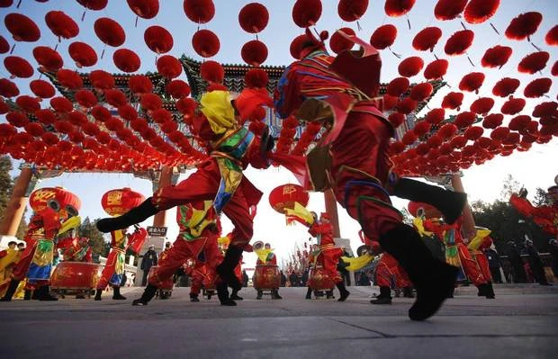 Traditional dancers perform during the opening of the temple fair for the Chinese New Year celebrations at Ditan Park, also known as the Temple of Earth, in Beijing January 30, 2014. (KIM KYUNG-HOON/REUTERS)