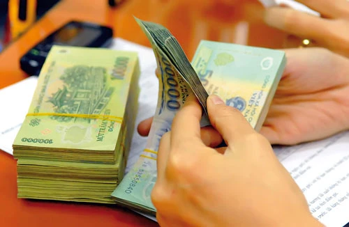 Thu nhập nhân viên ngân hàng sụt giảm mạnh (ảnh minh họa).