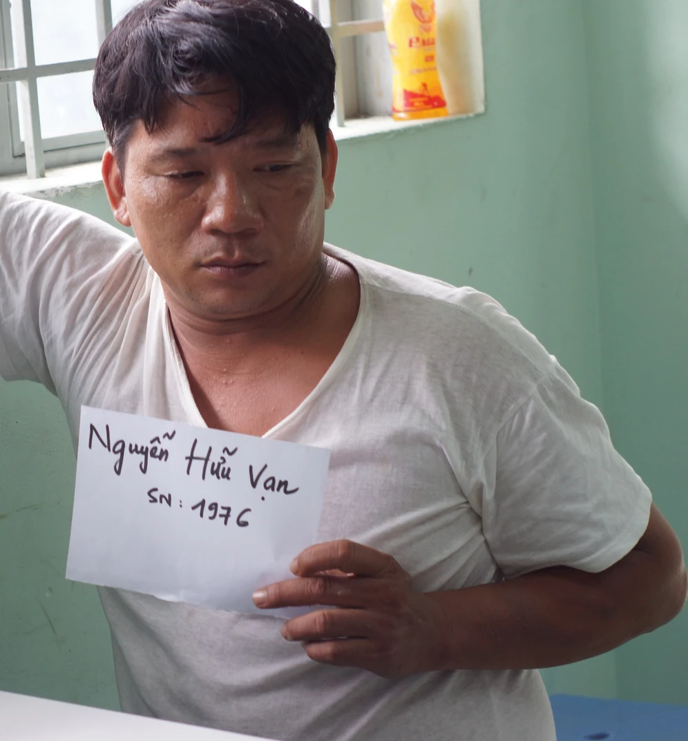 Tạt xăng đốt hai người để giải quyết mâu thuẫn ảnh 1