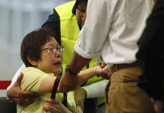 Nỗi đau tột cùng của thân nhân hành khách MH17 ảnh 7