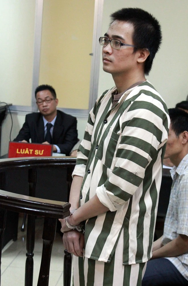 Nguyễn Đức Nghĩa tại phiên xử. Ảnh: Hà Anh.