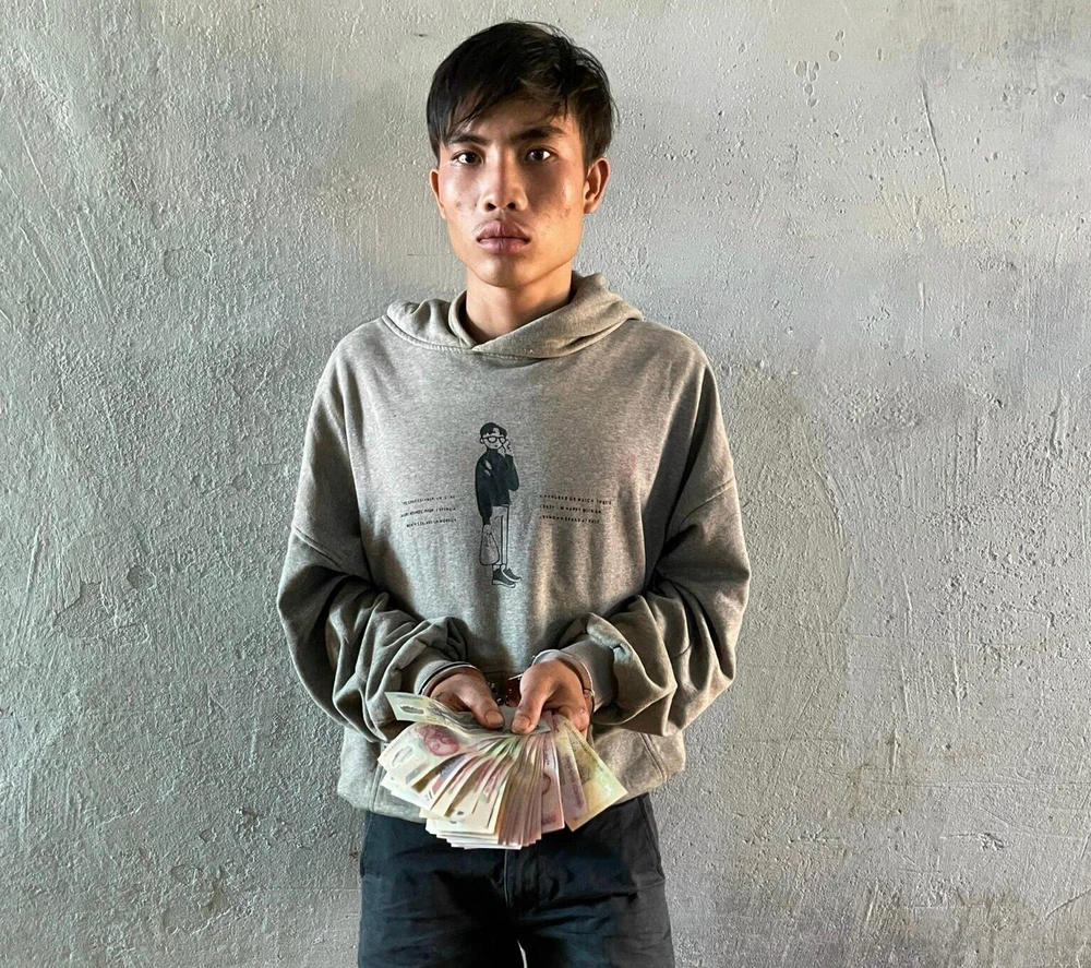 Lù Văn Biều tại cơ quan công an. Ảnh: LX