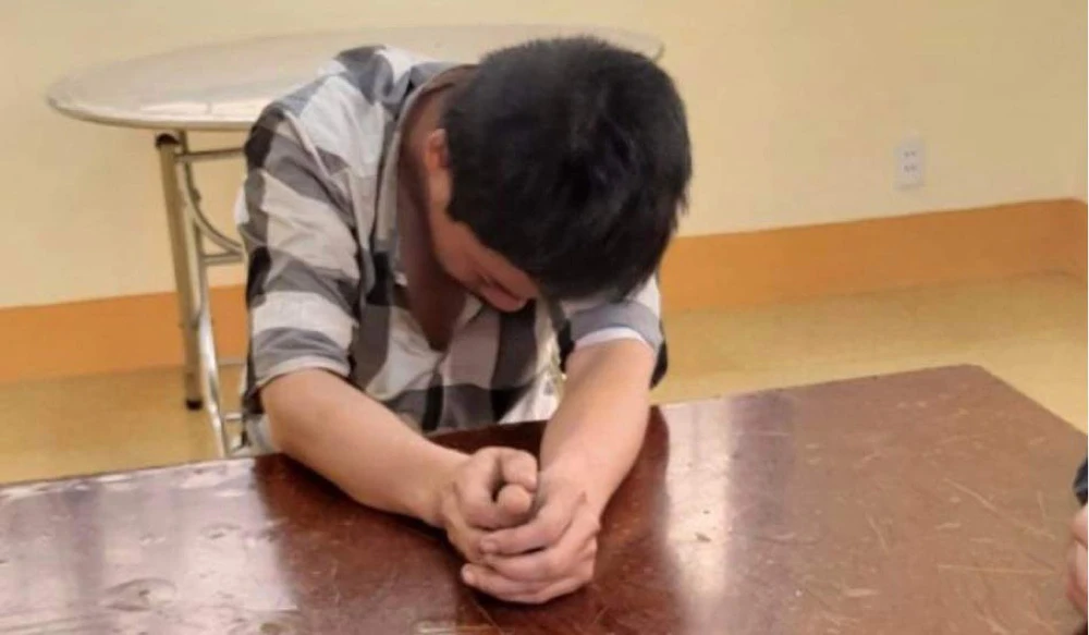 Phan QT tại cơ quan công an. Ảnh: TD