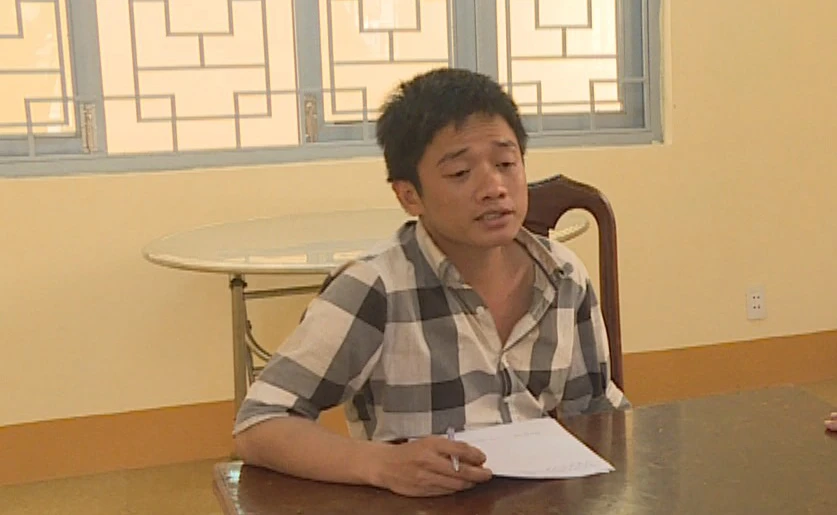 Phan Quốc Tuấn tại cơ quan điều tra. Ảnh: AX