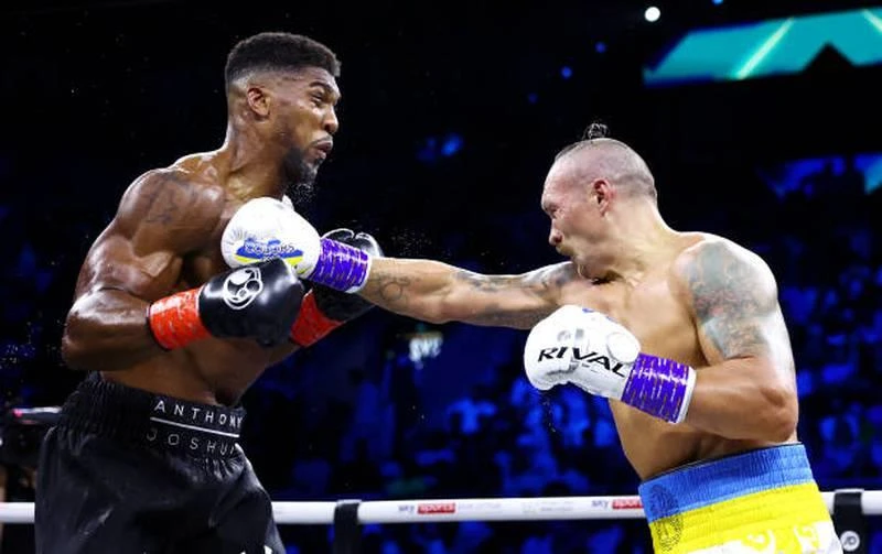 Joshua (trái) thua cuộc Usyk ở trận tái đấu rạng sáng 21-8 vừa qua sẽ thượng đài với Tyson trắng vào cuối năm nay để tranh đai WBC. Ảnh: Getty