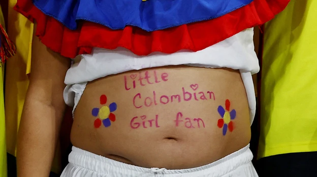Một fan nhí của Colombia trên sân Melbourne Rectangular. ...Fan Colombia mang đến Úc chất La tinh và lễ hội bóng đá. ...Sắc màu rất quen thuộc của các fan thuộc Mỹ La tinh. Fan nữ La tinh là luôn "quậy tới bến" tại World Cup. Pha ăn bàn của Catalina Usme vào lưới Jamaica. Catalina Usme, tác giả bàn thắng duy nhất trận Colombia-Jamaica đưa đội vào tứ kết. Người hùng Catalina Usme gào thét mừng bàn thắng. Cầu thủ Jamaica buồn khi cuộc hành trình của họ kết thúc. Ở vòng bảng, họ cầm hòa Pháp, cầm hòa và loại Brazil...rất ngoan cường. Fan Colombia sẽ tiếp tục đổ đến Úc cổ vũ đội nhà gặp nhà vô địch châu Âu-Anh ở tứ kết World Cup.