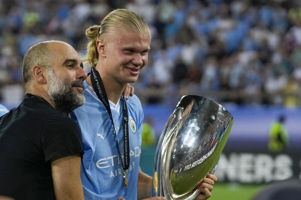 Haaland góp công lớn vào cú ăn ba của Man. City, Messi lại không giúp gì cho PSG, nhưng lại là "nhân vật số 1" đưa Argentina vô địch World Cup 2022 và mới có danh hiệu Leagues Cup cùng Inter Miami trên đất Mỹ. Ảnh: Getty