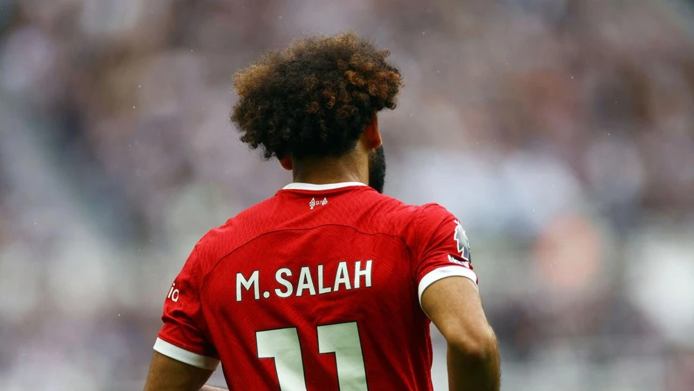 Al Ittihad ra giá 150 triệu bảng để đội có "bộ đôi sát thủ" Salah-Benzema, nhưng Liverpool không bán. Ảnh: AFP