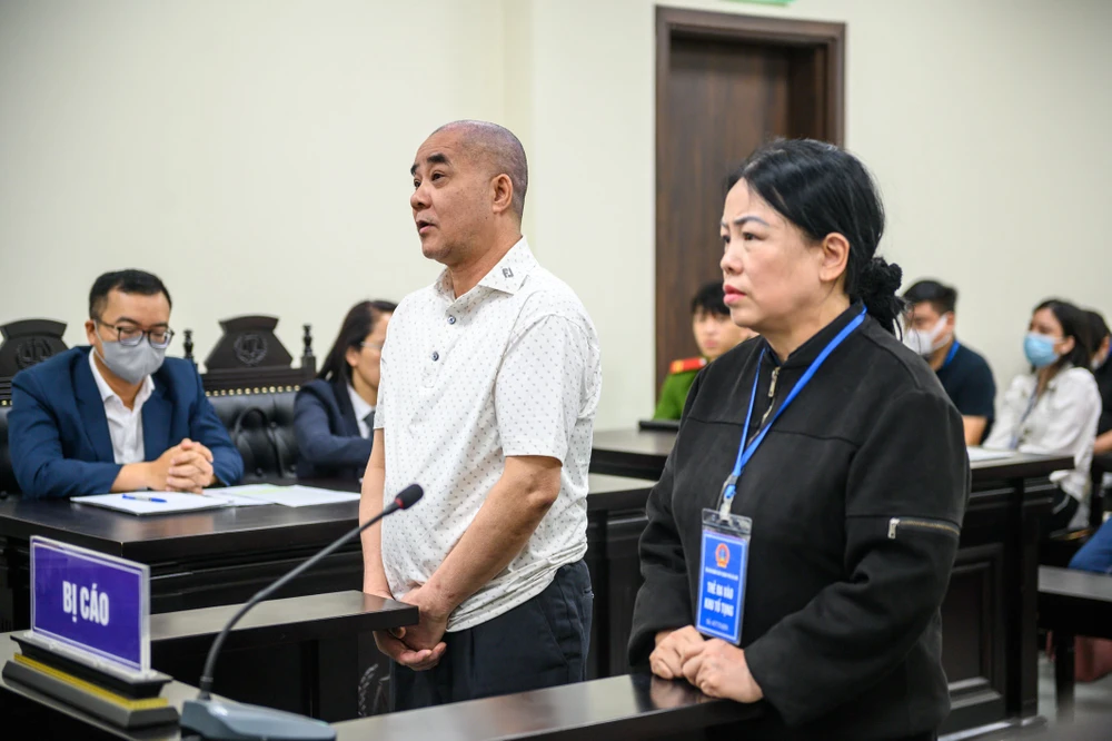 Các bị cáo tại phiên tòa. Ảnh: HN Các bị cáo tại phiên tòa. Ảnh: HN