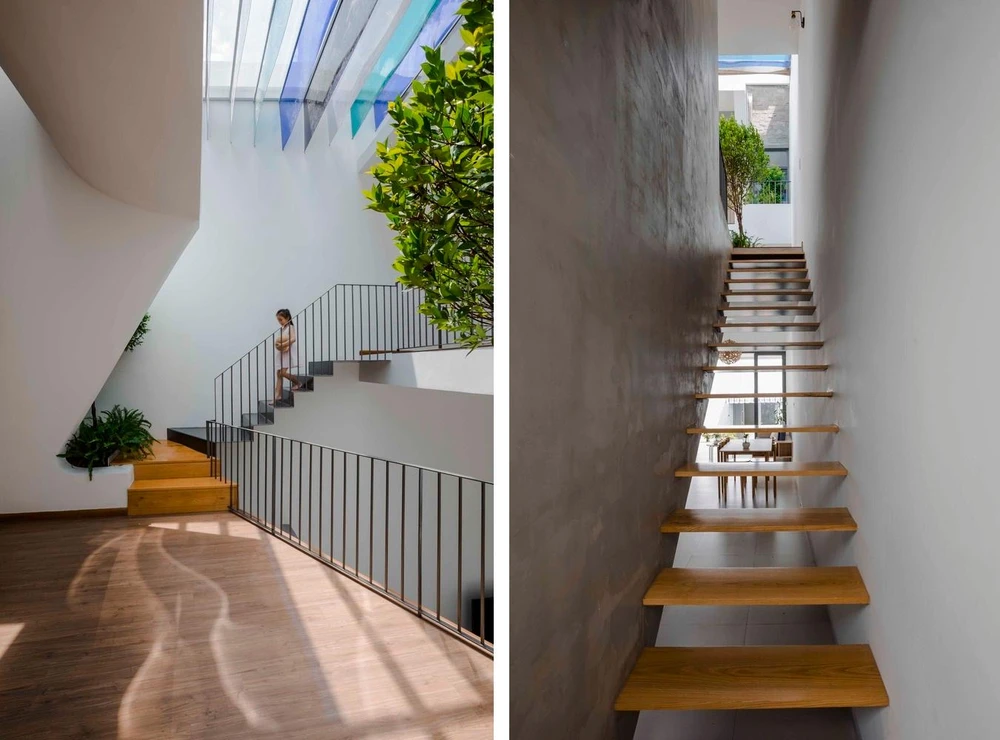 Hàng hiên đầy màu sắc đổ bóng gợn sóng trên sàn ốp gỗ.