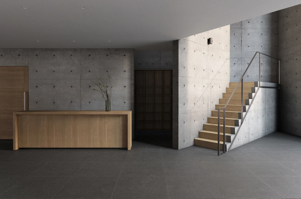 Ở sảnh tiếp đón và không gian cà phê tầng 1, kiến trúc sư tạo ra một cầu thang gỗ plywood sồi xoay nghiêng 45 độ để đi lên sàn phía trên.