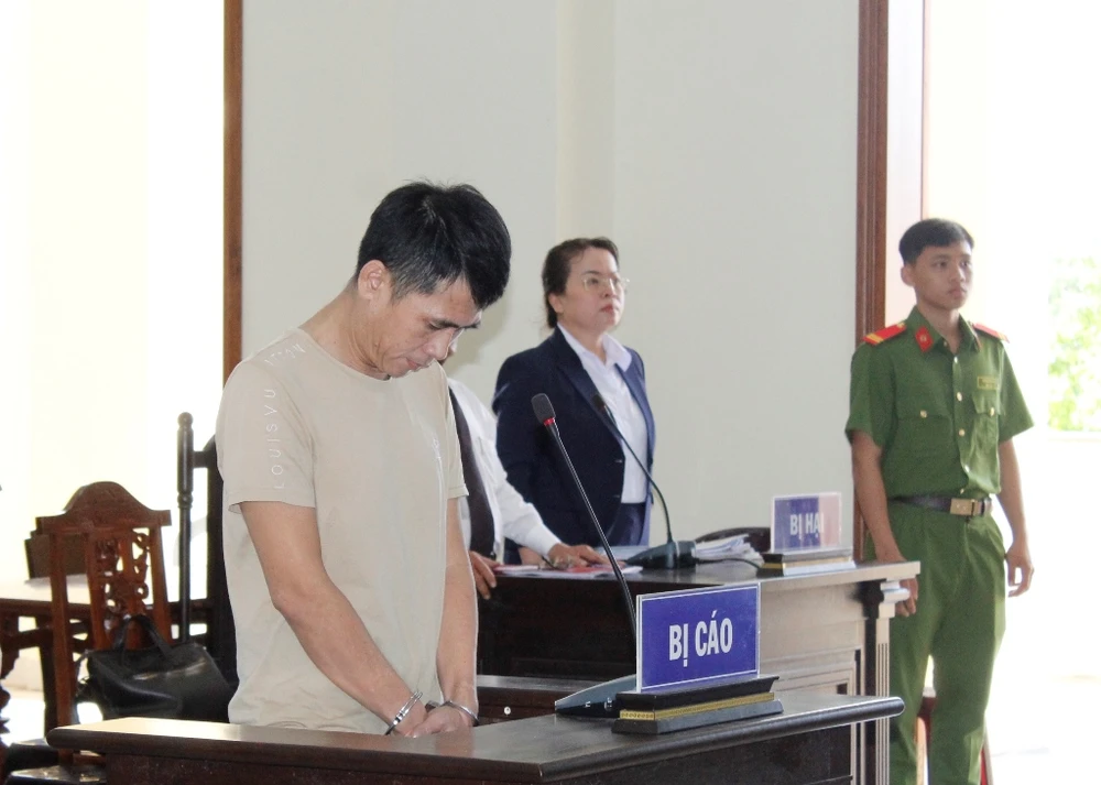 Bị cáo Trần Văn Minh tại tòa ngày 27-6. Ảnh: NHẪN NAM