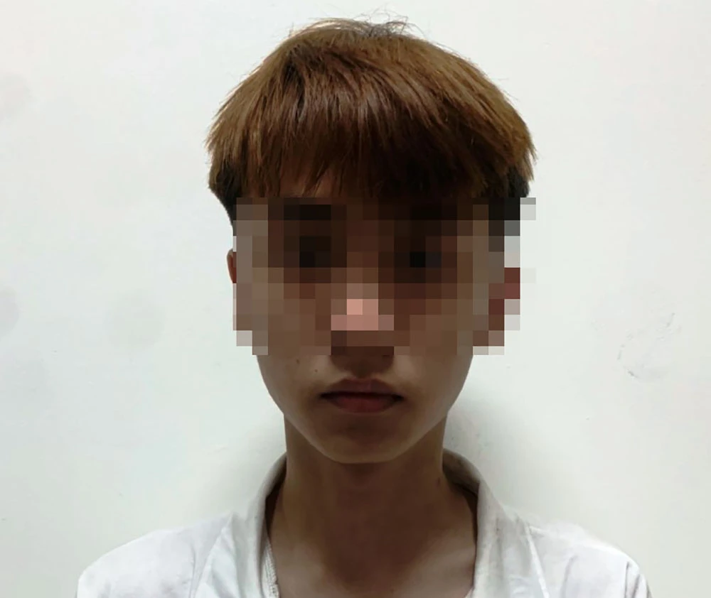 Nghi phạm Phạm Đình Kiên, cầm đầu nhóm người xông vào siêu thị chém người. Ảnh: HH