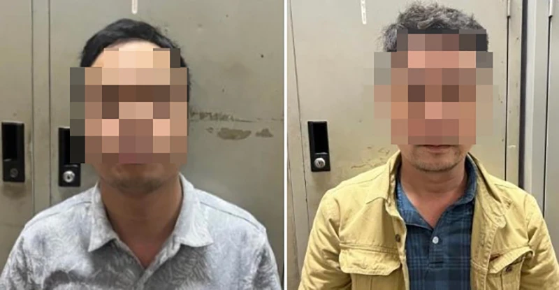 Nguyễn Trung Sáng (phải) và Bùi Minh Ngọc tại cơ quan điều tra. Ảnh CA