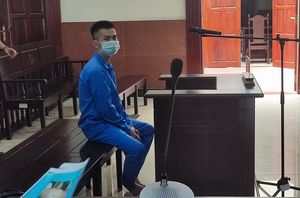 Bị cáo Trần Danh Thắng sát hại bạn ở chung lãnh án 20 năm tù. Ảnh: NGUYỄN THÀNH