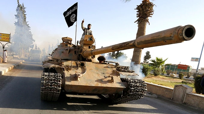 Cỗ máy kiếm tiền của tổ chức khủng bố 'Nhà nước Hồi giáo' ảnh 1