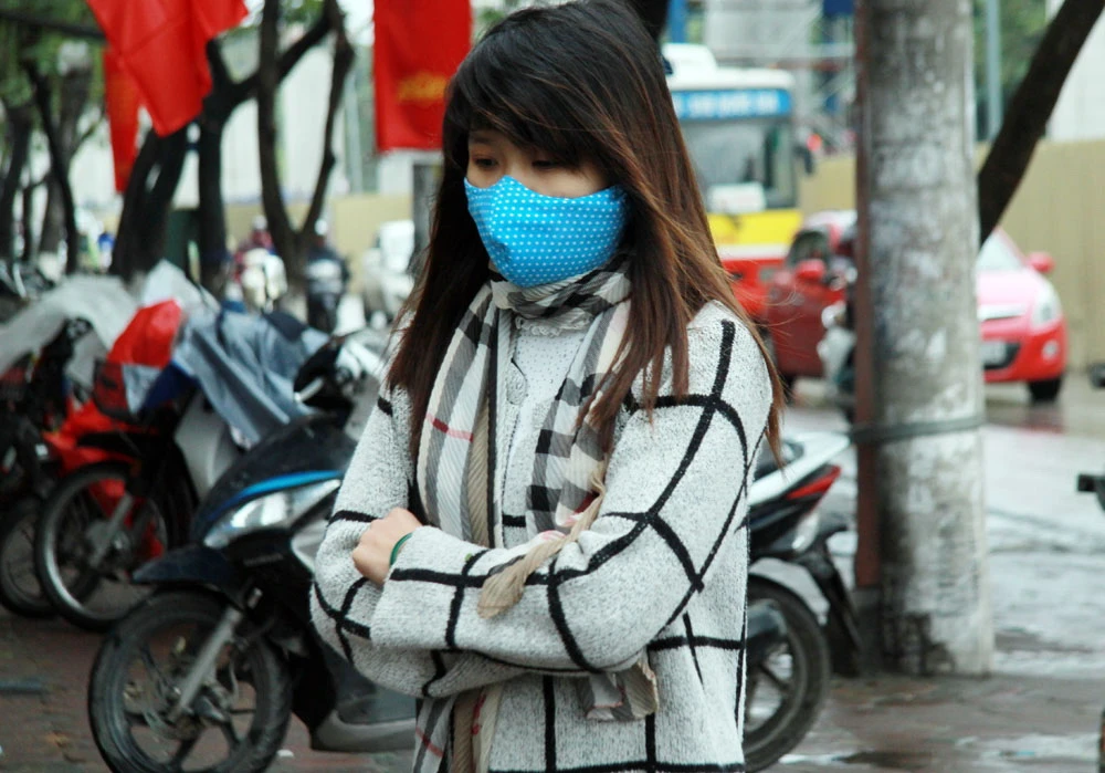 Người Hà Nội đốt lửa chống rét kỷ lục ảnh 10