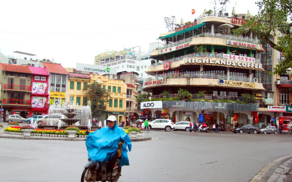 Người Hà Nội đốt lửa chống rét kỷ lục ảnh 2