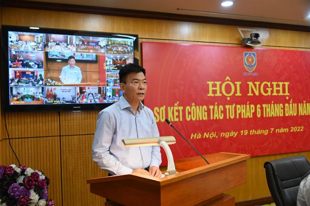 Bộ trưởng Bộ Tư pháp Lê Thành Long tại hội nghị. Ảnh: XĐ