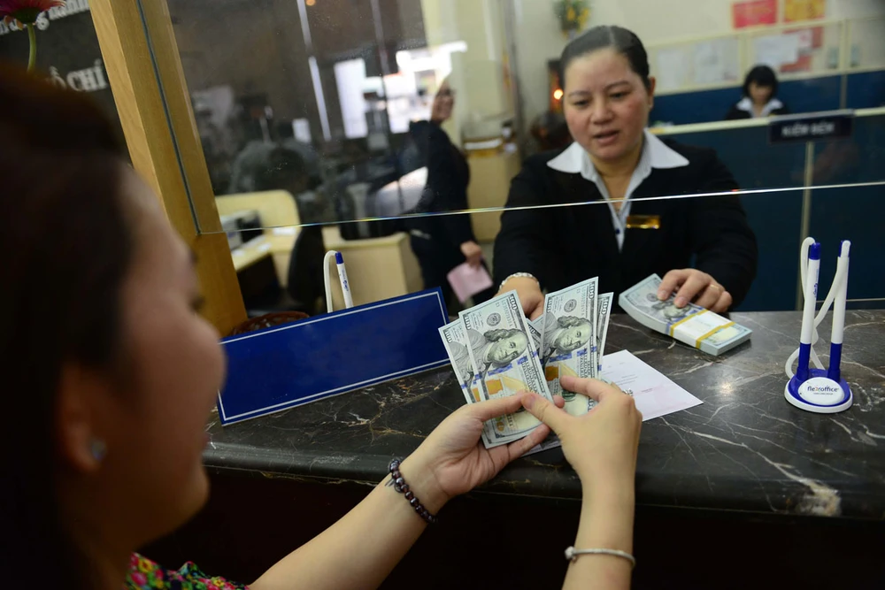 Dự báo dịp cuối năm, trước và sau tết Nguyên đán này lượng kiều hối chuyển về Việt Nam sẽ tăng lên. Ảnh: HOÀNG GIANG
