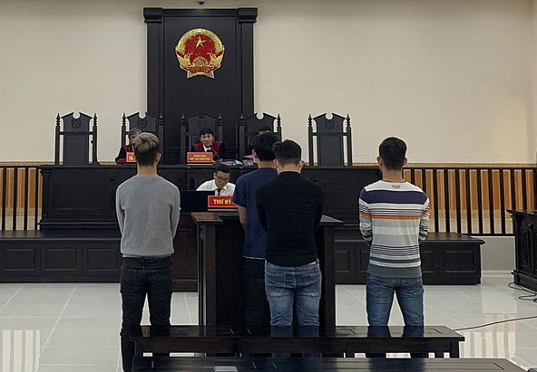 Bốn bị cáo tại phiên tòa. Ảnh: PN