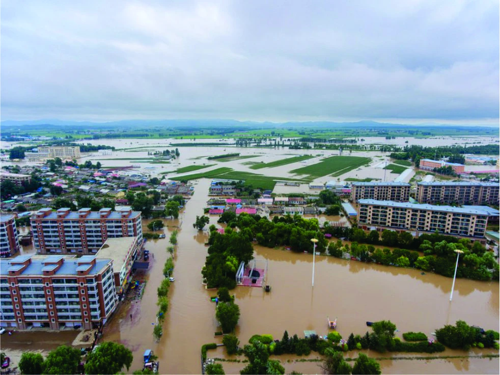 Ngập lụt ở Cáp Nhĩ Tân, tỉnh Hắc Long Giang, đông bắc Trung Quốc. (Ảnh do Tân Hoa Xã chụp ngày 5-8)