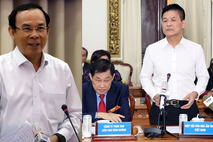 Bí thư Thành ủy TP.HCM Nguyễn Văn Nên (ảnh trái) ghi nhận ý kiến của các doanh nghiệp tại buổi đối thoại. Ảnh: HUY QUANG