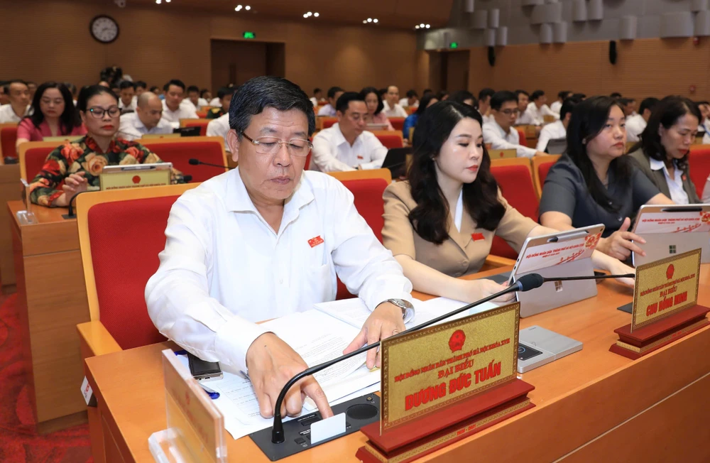 hdnd-tp-ha-noi-bam-nut.jpg