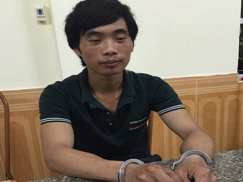 Tẩn Láo Lở tại cơ quan công an (Ảnh do cơ quan công an cung cấp)