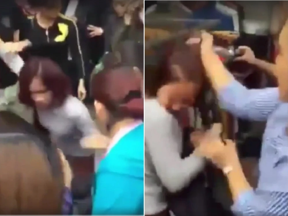 Hà Nội:Cô gái trộm điện thoại bị cả chục người đánh đập ảnh 1