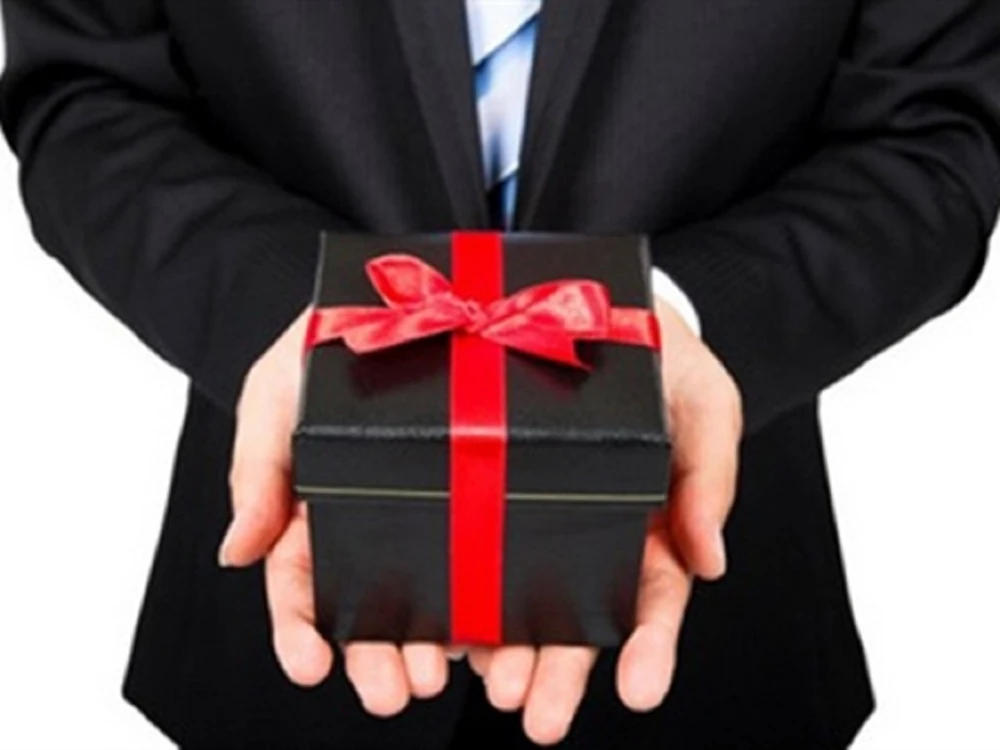 Bộ Công an: Cấm tặng quà, chúc tết cấp trên ảnh 1