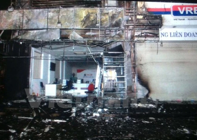 Cháy tòa nhà chi nhánh Ngân hàng Thương mại cổ phần Quốc Dân ảnh 1