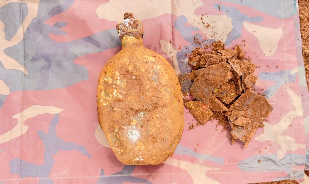 Đội K52 tỉnh Gia Lai tổ chức khai quật, phát hiện 18 hài cốt liệt sĩ và nhiều di vật tại làng Gà, xã Ia Boòng