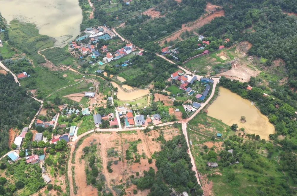 Bộ Tư pháp cho rằng quy định về đấu giá quyền sử dụng đất để giao đất hoặc cho thuê đất trên địa bàn Thủ đô có nội dung chưa phù hợp với quy định của Luật Đất đai. Ảnh: TRỌNG PHÚ