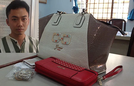 Bắt tài xế taxi trộm tài sản của khách ảnh 1