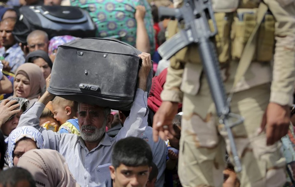 Ảnh: Người dân IRaq lũ lượt chạy trốn IS ảnh 8 Ảnh: Người dân IRaq lũ lượt chạy trốn IS ảnh 8