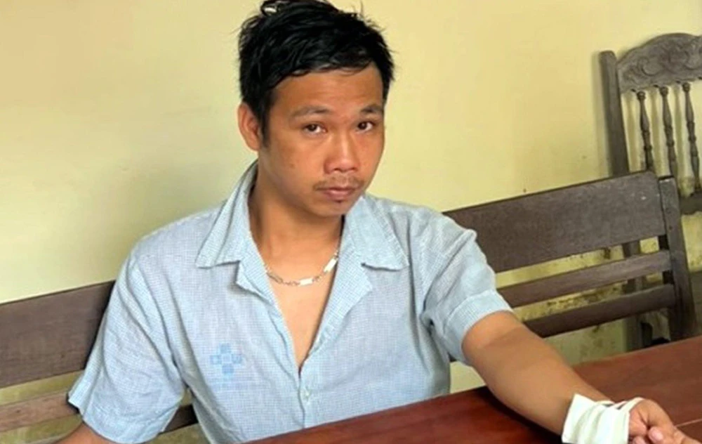 Trần Tích Tùng tại cơ quan công an. Ảnh: CA