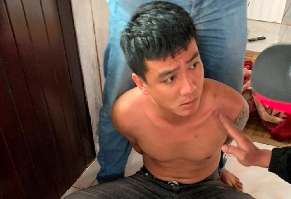 Nghi phạm ĐTQ bị bắt giữ. Ảnh: PL