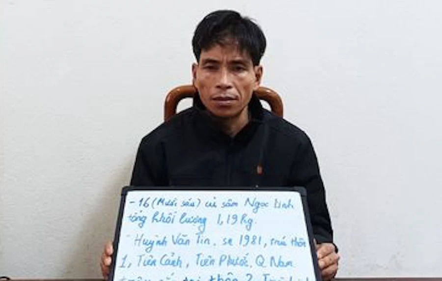 Huỳnh Văn Tin tại cơ quan công an. Ảnh: CA