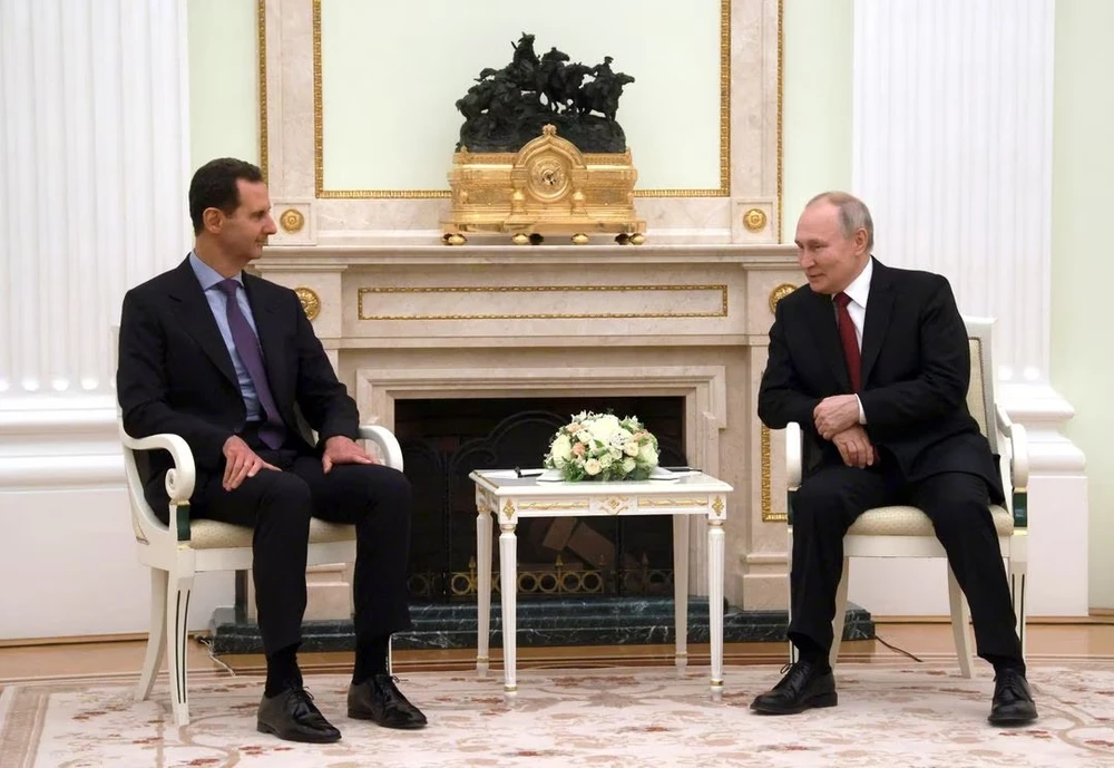 Tổng thống Syria Bashar al-Assad (trái) và Tổng thống Nga Valdimir Putin hôm 15-3. Ảnh: SPUTNIK