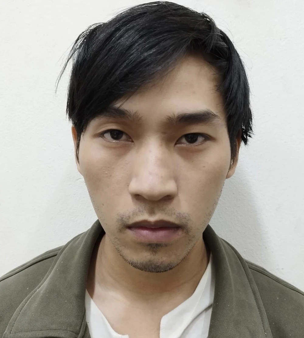 Hoàng Anh Thiện tại cơ quan điều tra. Ảnh: CA