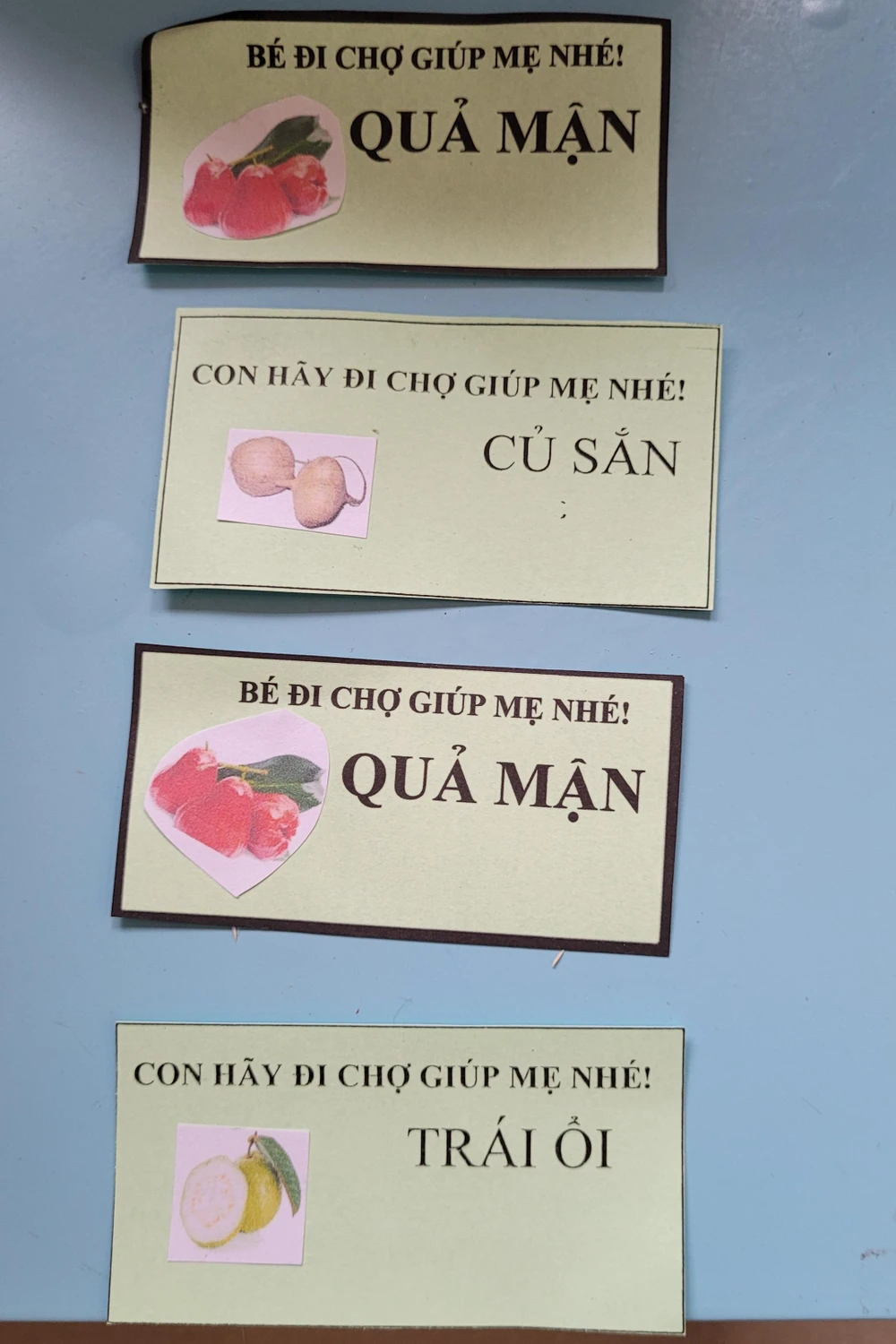 Phiếu mua hàng dành cho các bé đi chợ trên có in hình món hàng muốn mua.