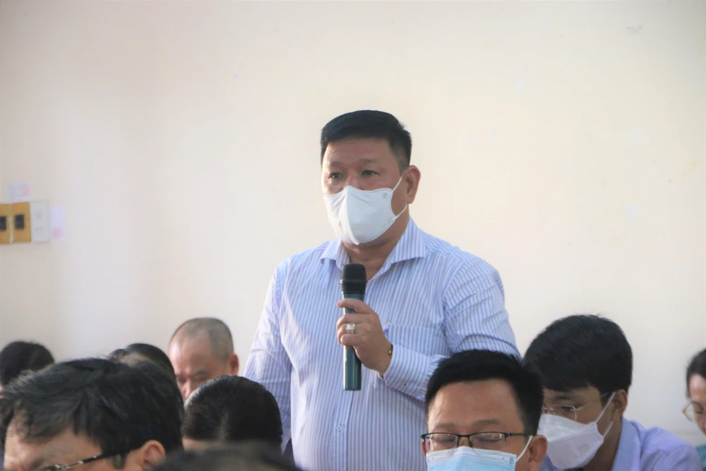 Ông Phan Minh Thắng báo cáo tại lễ sơ kết. Ảnh: THẢO PHƯƠNG